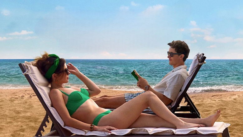 A brightly lit hotel balcony at dusk