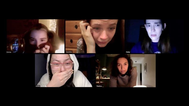The Zoom call grid, each face framed in its own little box, the camera angles just slightly off—like we’re looking at them through a keyhole.