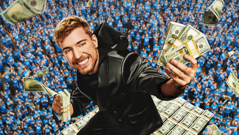 Jimmy Donaldson standing next to a literal mountain of stacked cash