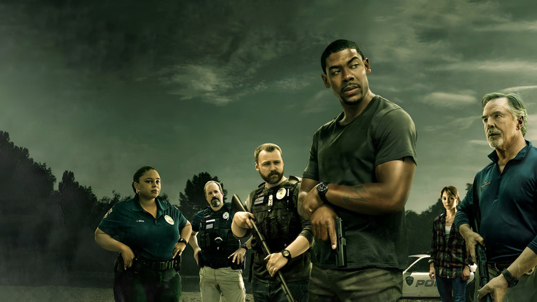 A lone figure stands at the edge of a rural road, the weight of the world pressing down on his shoulders.
