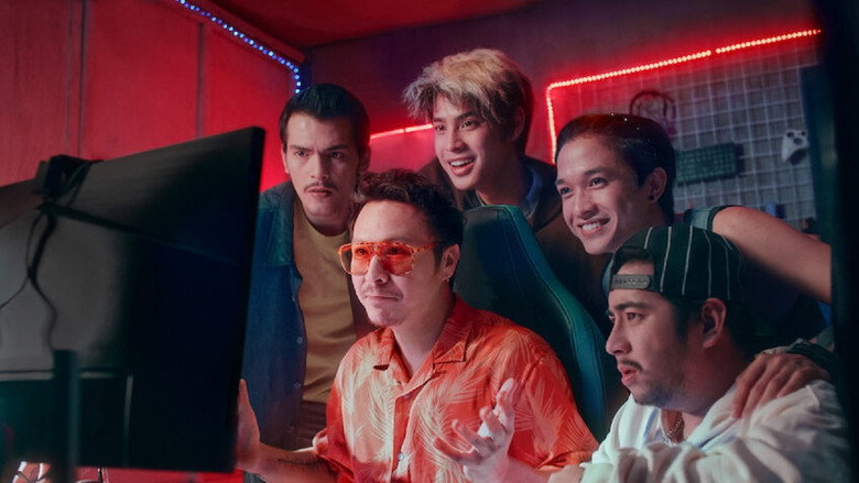 Seth and his team huddled around a glowing monitor, their faces lit by the blue light of the game.