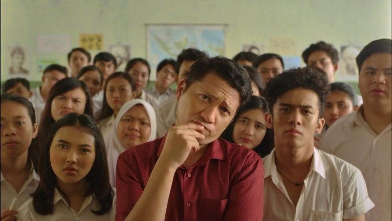 A classroom scene with teachers and students gathered around a desk, the mood shifting from frustration to determination