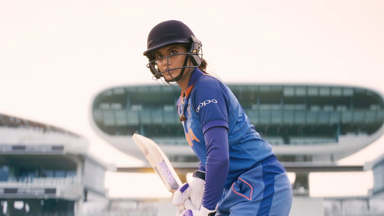 A young Mithali Raj, bat in hand, stares down the camera with quiet defiance.