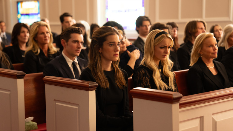 Clara and Miller sitting on the hood of a car