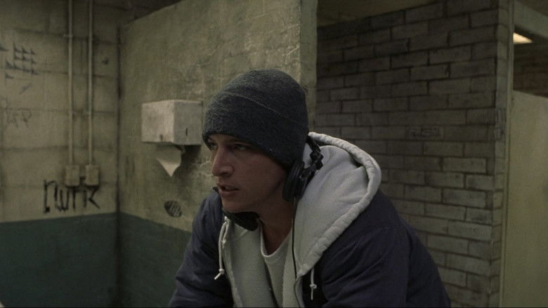 The chaotic, brightly lit suburban kitchen scene that descends into pure slapstick.