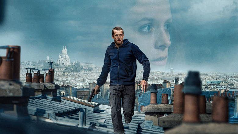 A tense standoff in a dimly lit Parisian apartment, Franck Lazareff (Guillaume Canet) cornered by masked intruders