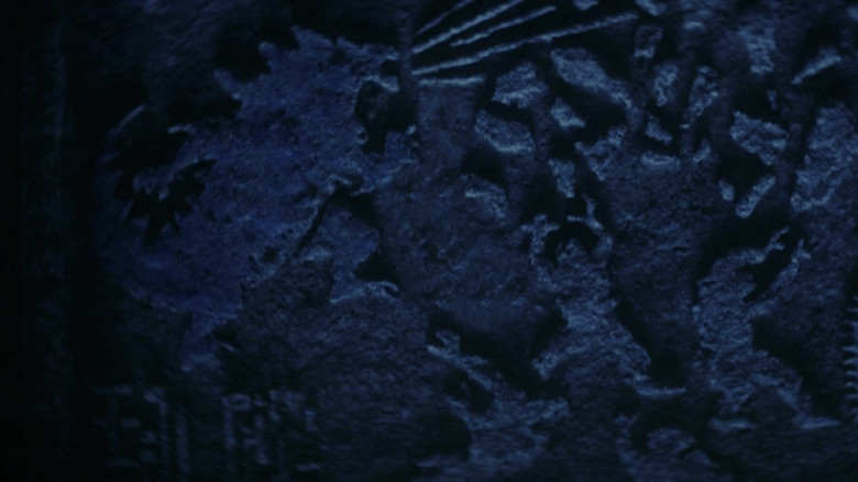 The humans staring in awe at a glowing Hollow Earth portal