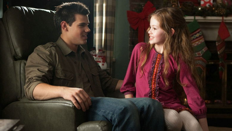 The Cullens and their assembled allies standing in the snow