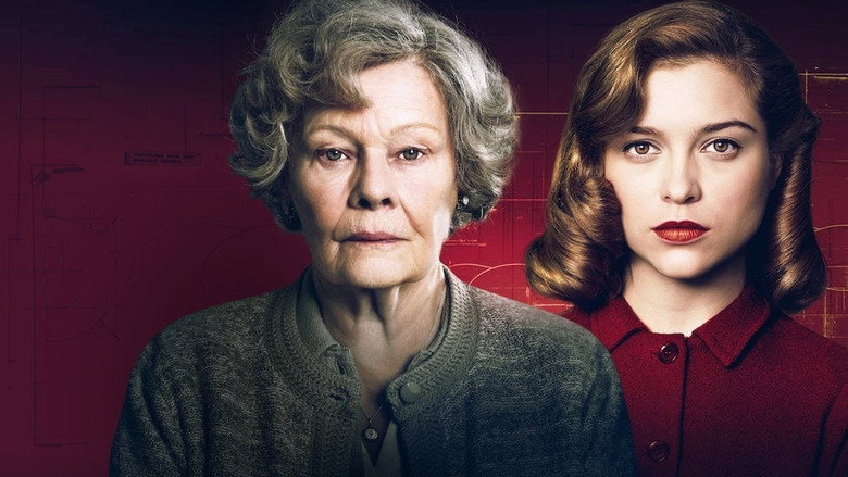 A quiet interrogation room, where Joan Stanley (Judi Dench) sits across from two stern-faced intelligence officers, the weight of decades hanging between them.
