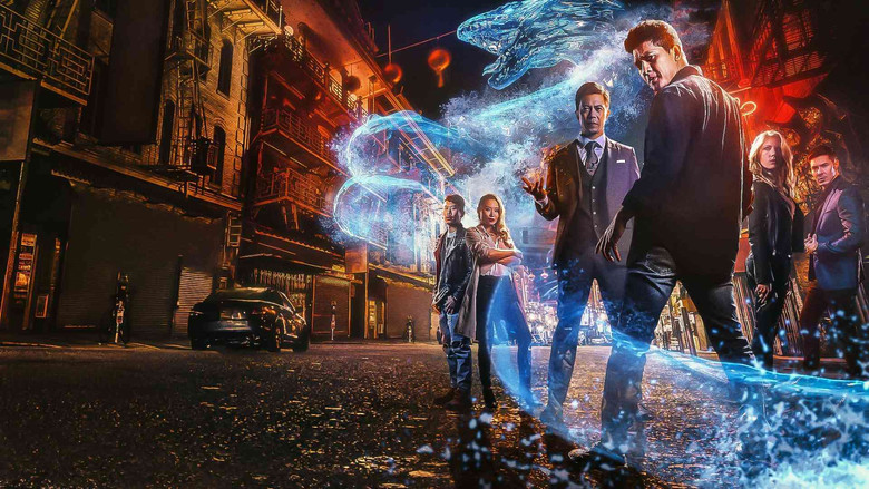 Kai Jin mid-fight, his body a blur of motion against neon-lit Chinatown streets