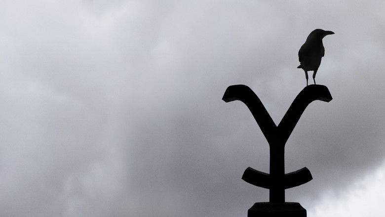 John Dutton and his cowboys on horseback looking over the valley