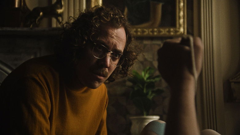 Two people standing in a dimly lit space