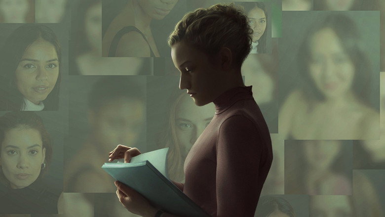 Jane sits alone at her desk, the glow of her computer screen casting sharp shadows across her face.