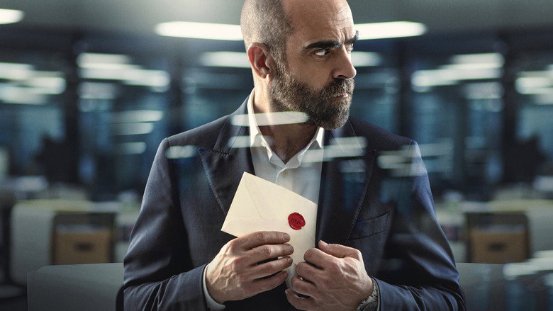 A dimly lit boardroom, the glow of a laptop screen casting sharp shadows on Victor Genovés’ face as he reads the blackmail note for the first time.