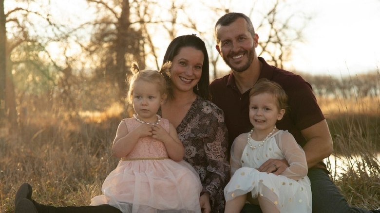 A still from the film showing Shanann Watts smiling in a family photo, her daughters tucked close to her sides.