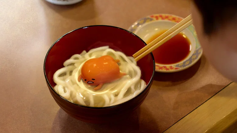 Gudetama and Shakipiyo sit on a park bench, the former slumped in existential despair while the latter bounces with naive optimism