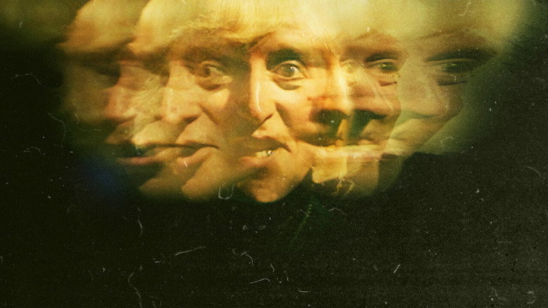 A grainy archival shot of Jimmy Savile mid-performance, his grin wide and unsettling, the camera capturing the eerie disconnect between his public charm and private cruelty.