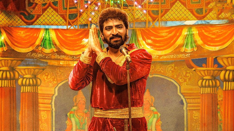 Two Koothu performers mid-act, their faces painted in vibrant colors, arms raised in exaggerated gestures