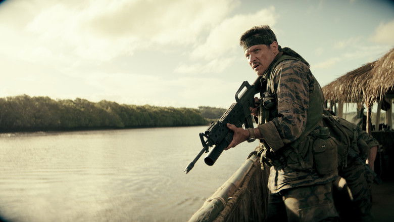 A soldier prepares to fire a heavy weapon in the jungle