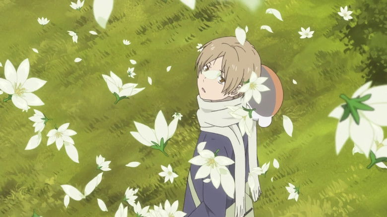 Natsume holding the Book of Friends