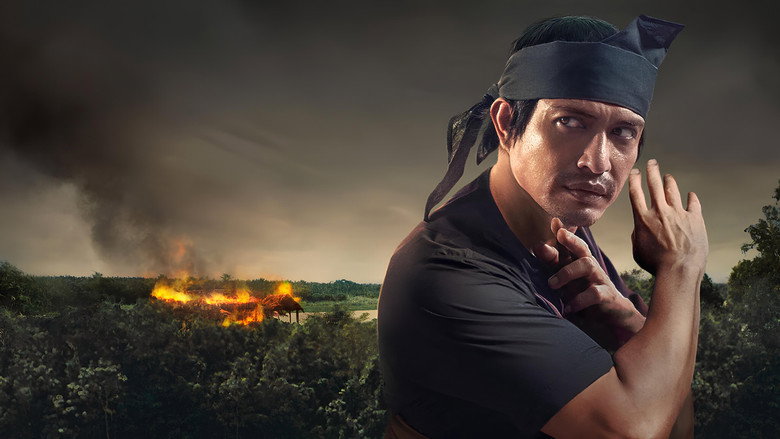 A lone warrior stands in a misty jungle clearing, his silhouette framed against the dappled light, a spear held loosely at his side.
