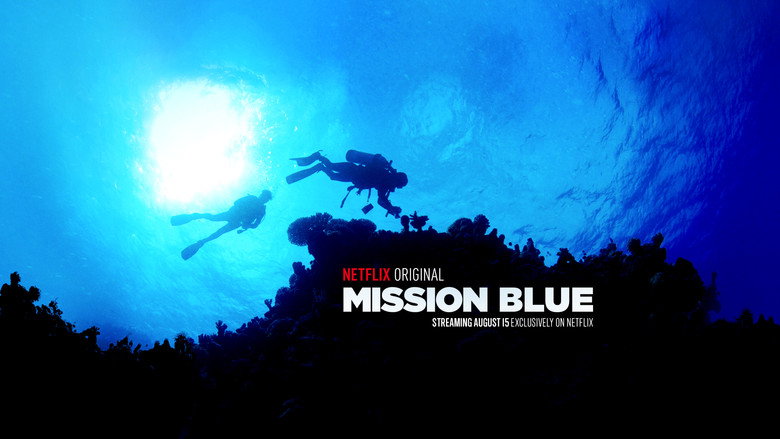 Sylvia Earle in a wetsuit, surrounded by deep blue water, her face illuminated by the faint glow of sunlight filtering through the surface