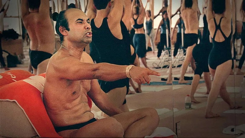 A dimly lit yoga studio, mirrors reflecting rows of students in downward dog, the heat palpable even through the screen.