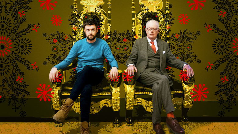 Jack and Michael Whitehall sitting on a boat, looking out at the water with expressions that mix amusement and mild discomfort