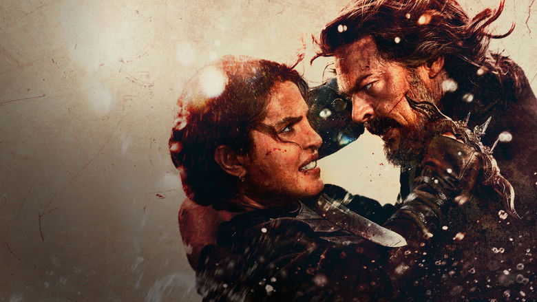 A lone figure standing against the Caribbean sunset