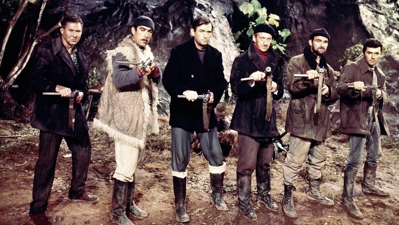 A tense moment as the commandos scale the cliffs of Navarone, the vast expanse of the Aegean Sea stretching behind them