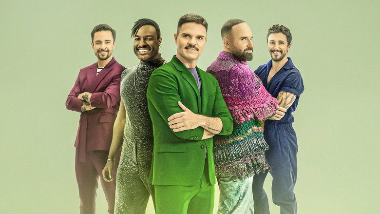 The Fab Five stand in a sunlit living room, arms crossed, smiling at the camera with the easy confidence of people who know they’re about to change someone’s life.