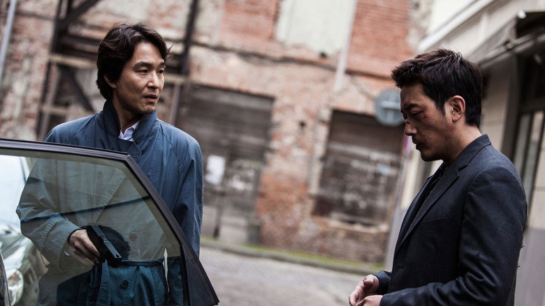 A tense standoff in a dimly lit Berlin alley, where operatives from opposing sides face off in silence.