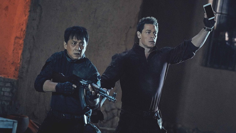 Jackie Chan and John Cena standing back-to-back in the middle of a desert firefight
