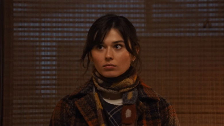 Connor and Jenny having a tense conversation on a suburban porch