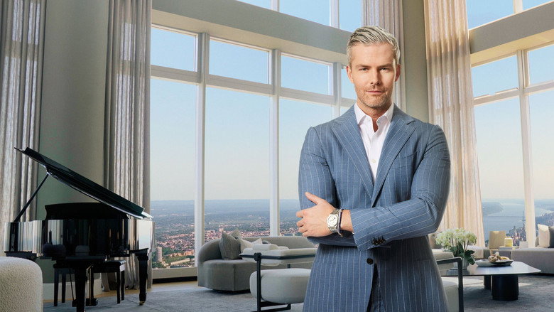 A sleek, high-ceilinged real estate office with floor-to-ceiling windows overlooking Manhattan, agents gathered around a glass conference table