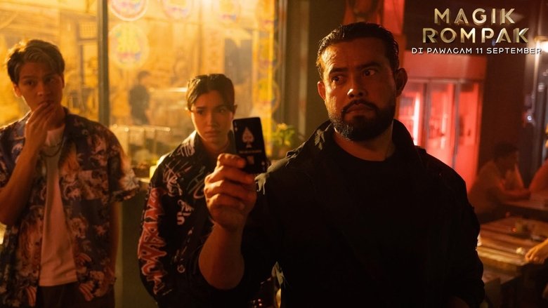 The crew huddles in a dimly lit backstage area, their faces half-lit by the glow of a single bulb, tension palpable as they prepare for the heist.