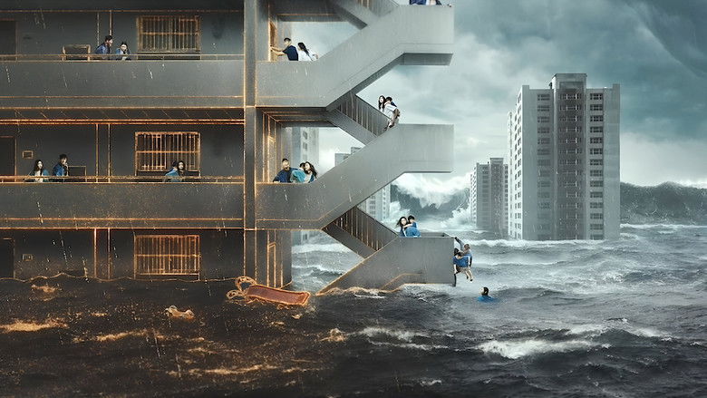 A massive wave crashing into the apartment complex