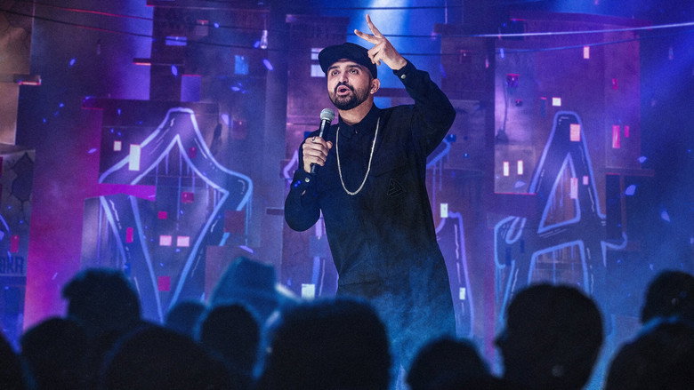 Ventura mid-performance, arms outstretched, embodying the "pose de quebrada" with a grin that suggests he’s about to drop a truth bomb.