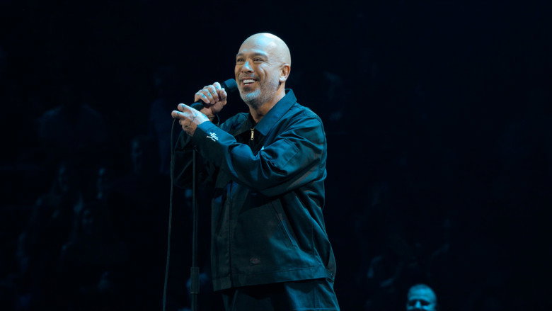 Jo Koy performing on stage