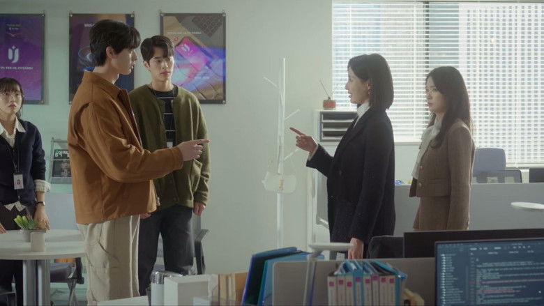 Seon-ho looking frustrated at his messy writer's desk