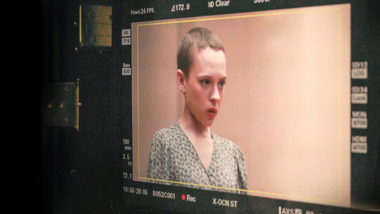 A still from *Making Unorthodox* showing the production team reviewing scripts and costumes, the weight of representation visible in their expressions.