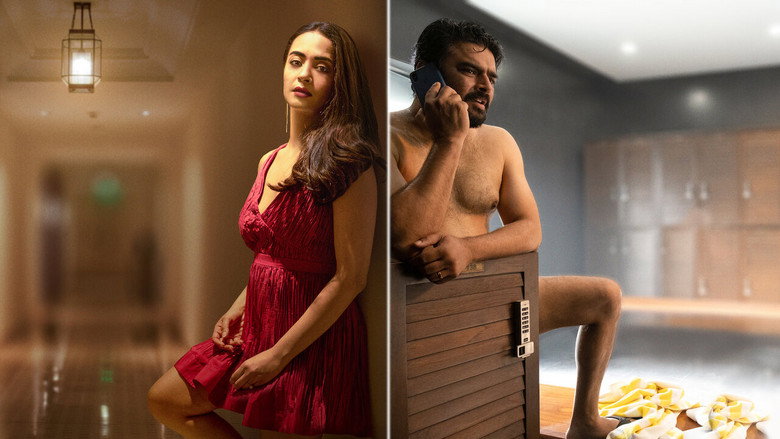 Aryan and Shruti sit on opposite ends of a couch, the space between them charged with unspoken tension.