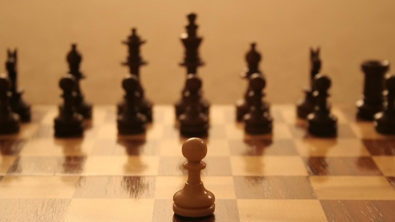 Close up of chess pieces on the board