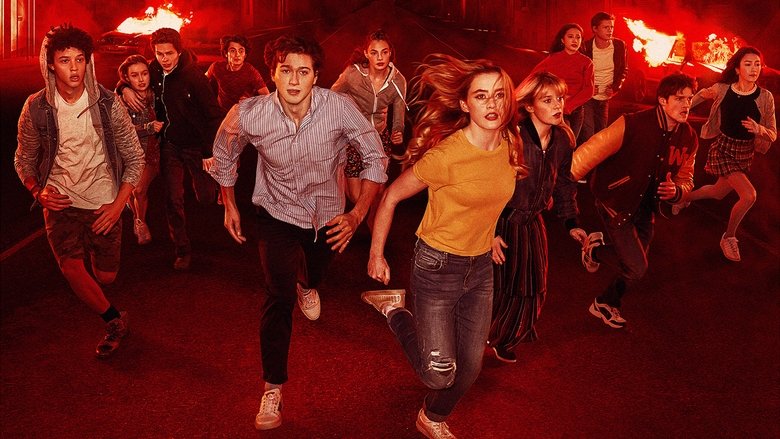 A dimly lit town hall meeting, where Cassandra stands at a podium addressing a restless crowd of teens, their faces a mix of hope and suspicion.