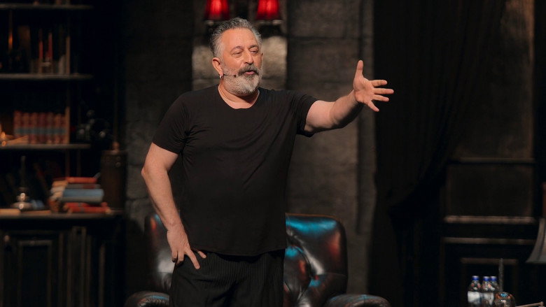 Cem Yılmaz gesturing emphatically during a punchline