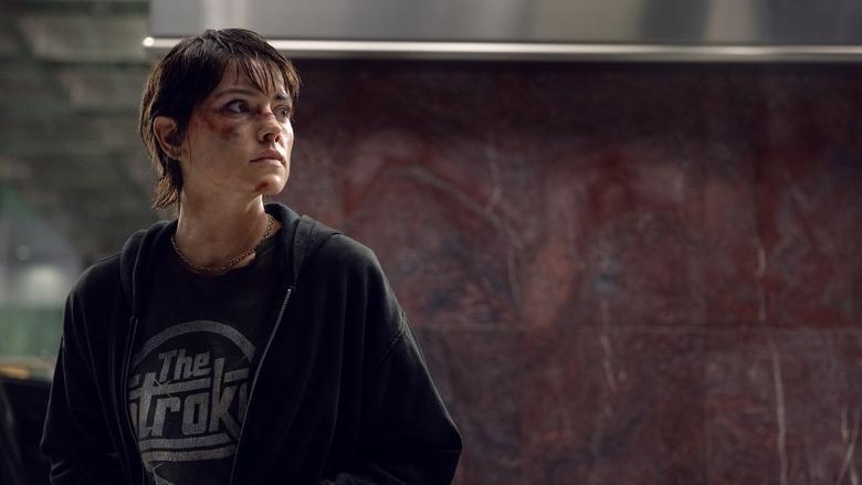 Clive Owen's weary eco-terrorist leader assessing the hostages