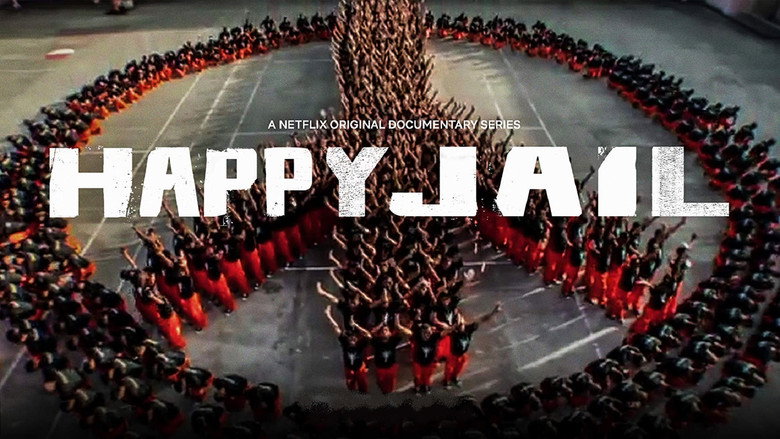 A group of inmates in orange uniforms perform a synchronized dance routine in a prison yard