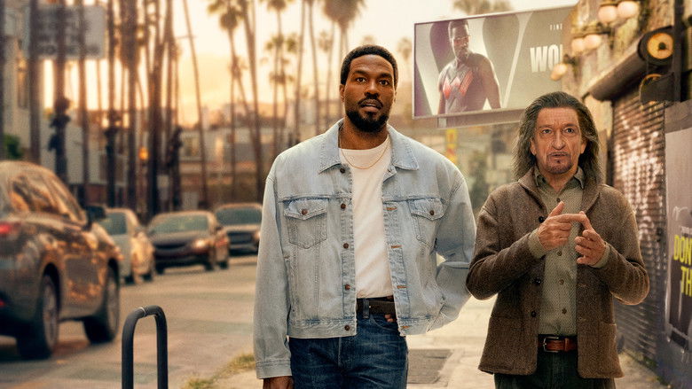 Simon sitting alone in a casting office waiting room