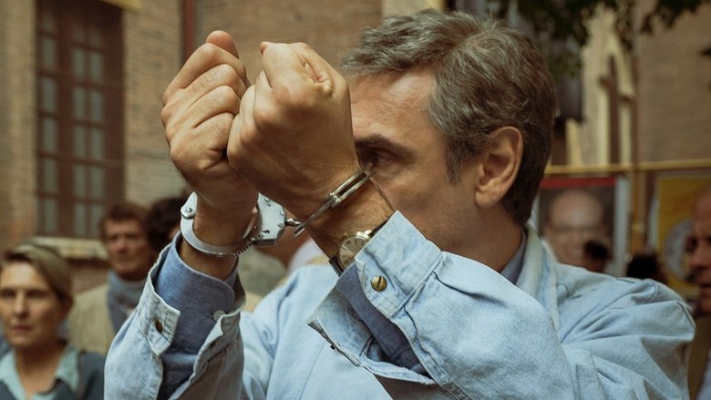 Tortora in an interrogation room looking bewildered