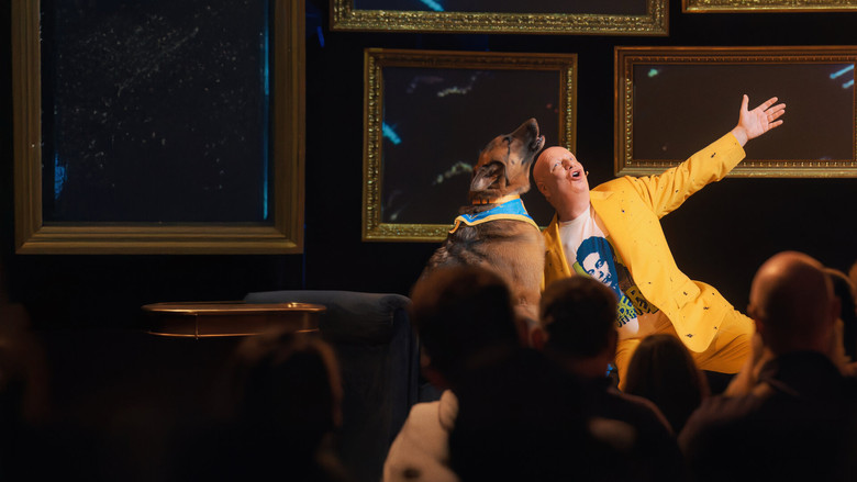 The stage setup for Ross's Broadway debut, bathed in deep, moody theater lights.